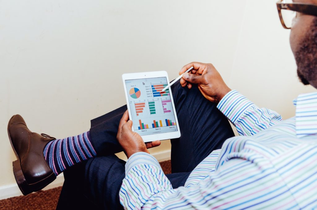 Professional reviewing analytics dashboard