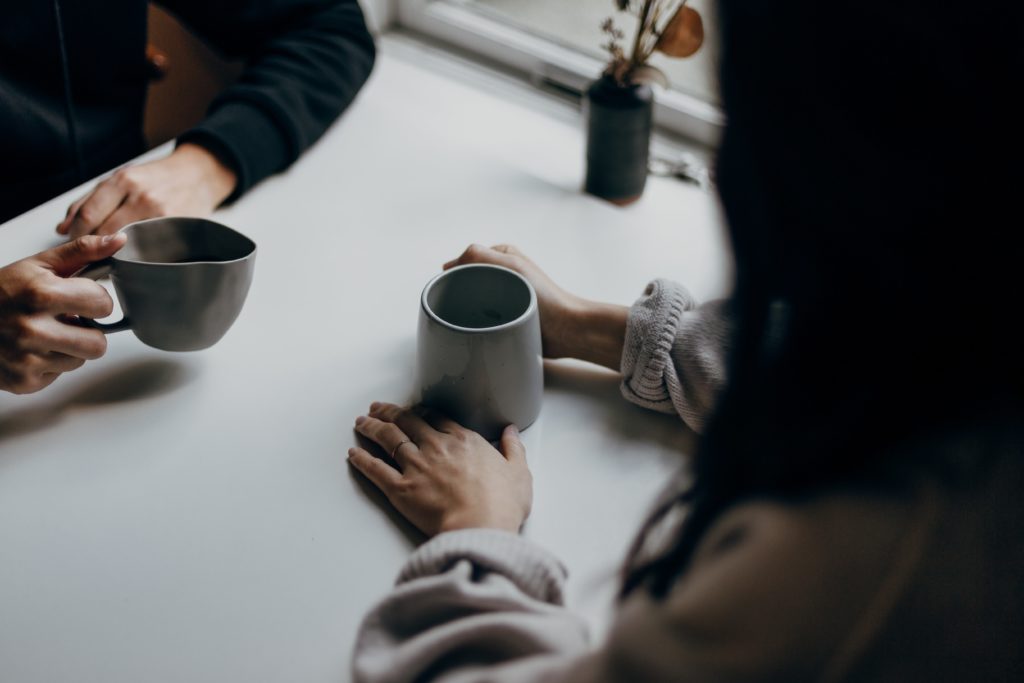Talking over two cups of coffee